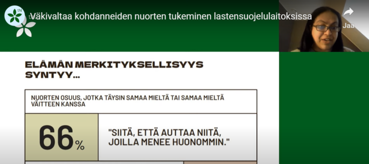 Kuvakaappaus diasta "Elämän merkityksellisyys syntyy.." ja puhuja.